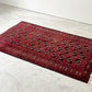 ビンテージ Vintage ビンテージラグ トライバルラグ レッド系 185×110cm メムリングギュル文様 幾何学模様 イラン トルクメニスタン バルーチ族 ●